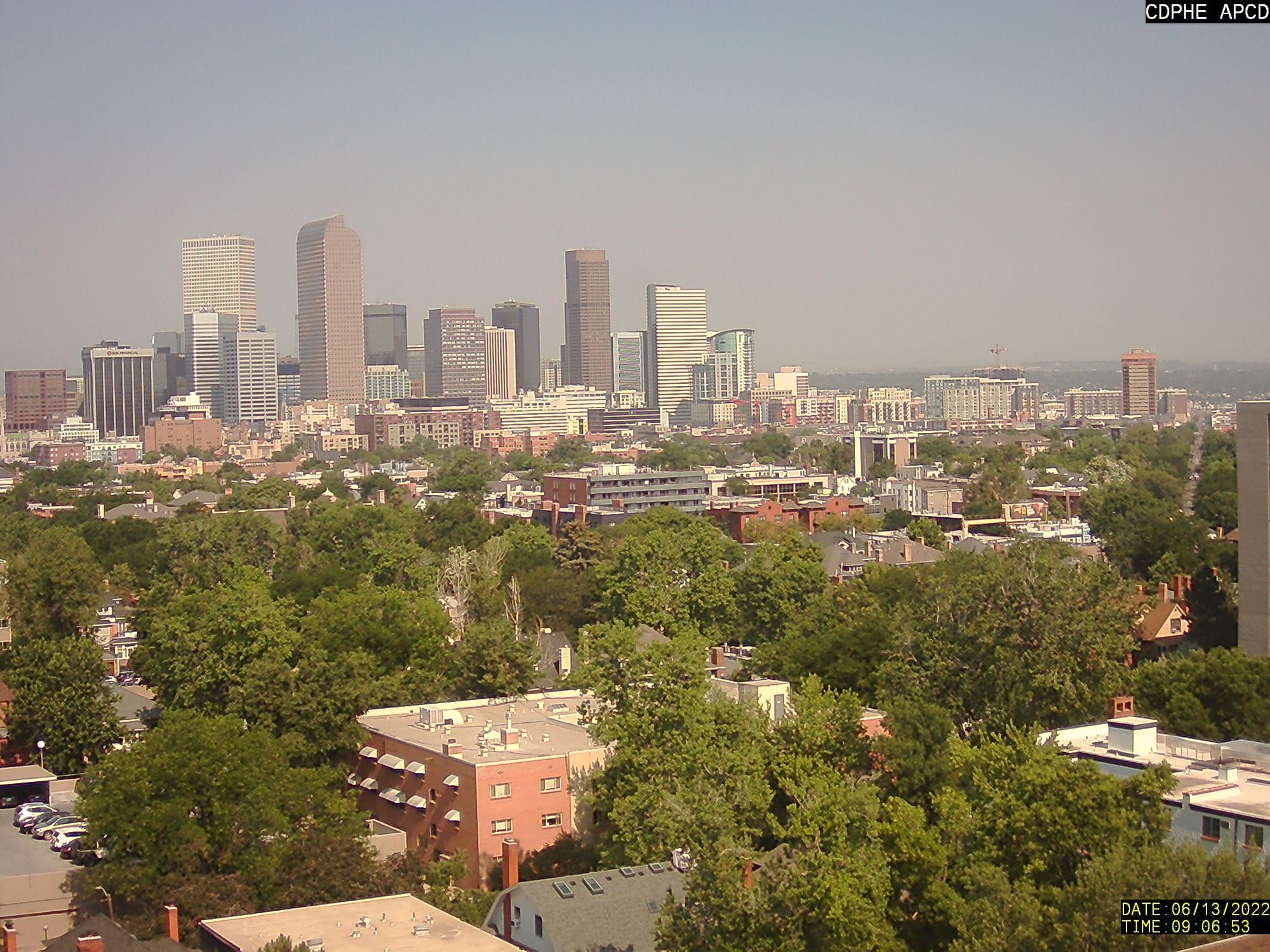 image: Smoky sky with near-record temperatures in Denver area Monday